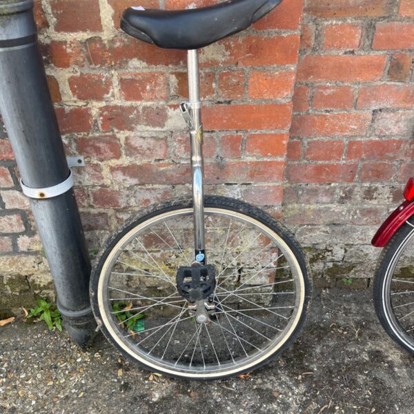 Chrome unicycle for adults and big kids, single wheel cycle.
