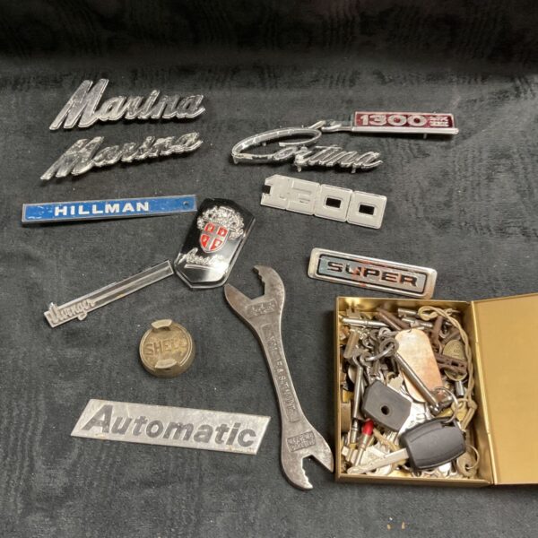 Vintage classic car badges and parts lot including Hillman.