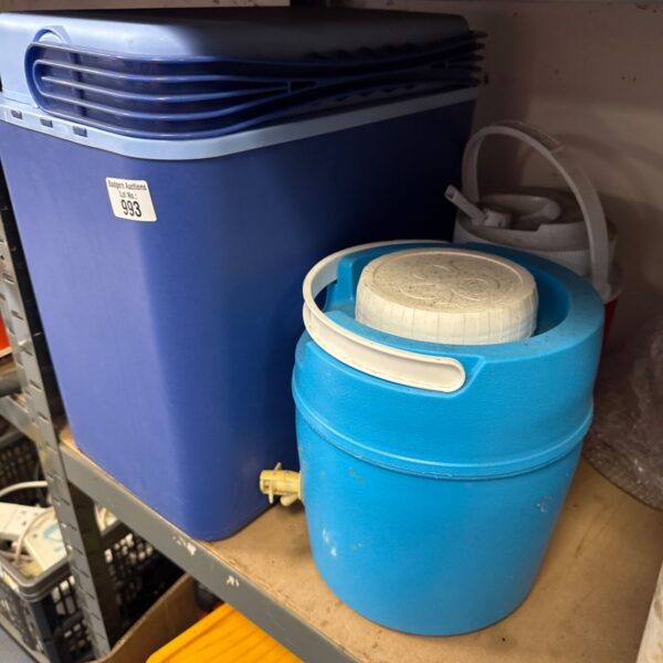 Blue cold drinks dispenser and cool box for summer refreshments.