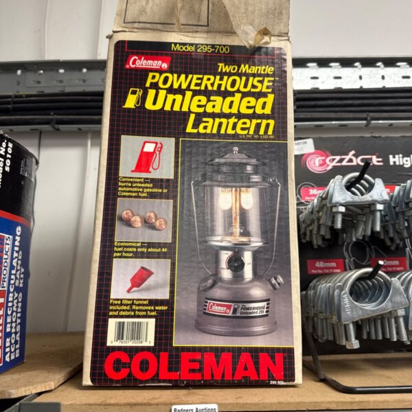 Front view of vintage Coleman Powerhouse lantern in its original box.