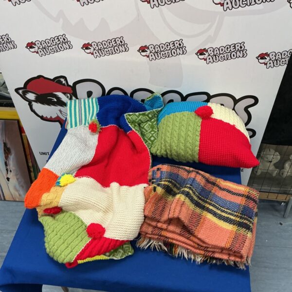 Colourful knitted blanket and pillow set, handmade patchwork design.
