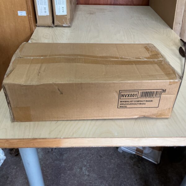 Compact basin in original packaging, model NVX001.
