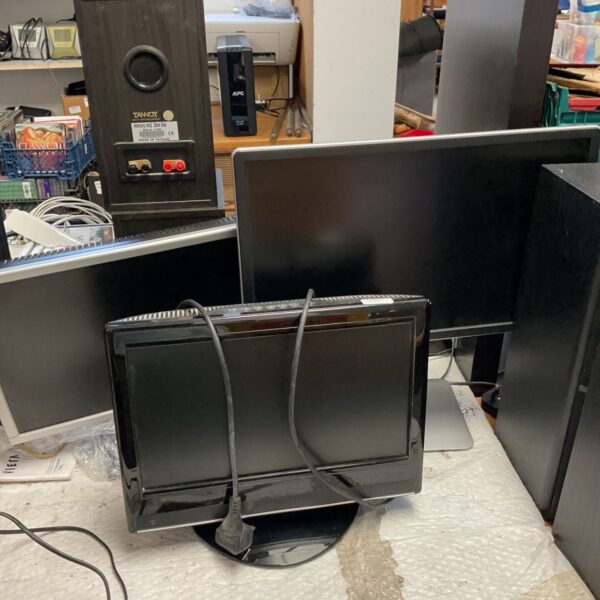 Black computer monitor with DVD player connections.