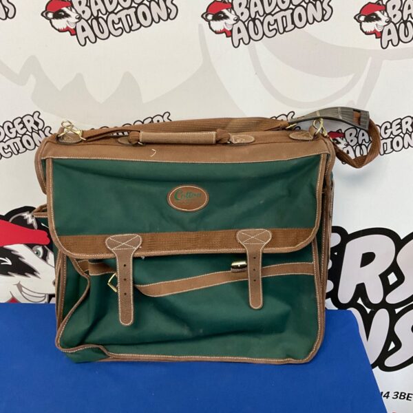 Green Cotton Traders canvas shoulder bag with buckle detail.