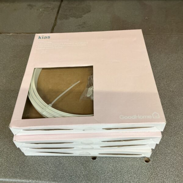 Four packs of unopened plastic curtain coil rack for window treatments.