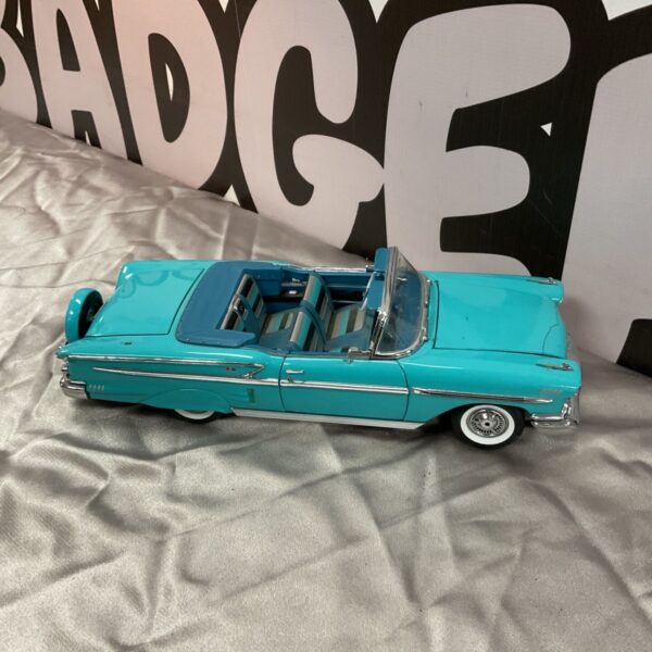 Detailed Danbury Mint 1958 Chevrolet Impala diecast model car.
