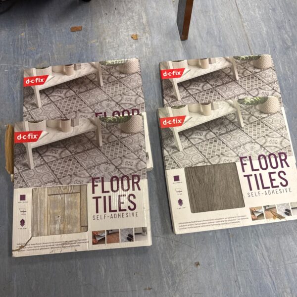 Four packs of unopened d-c-fix self adhesive floor tiles.