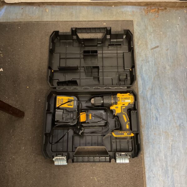 Dewalt 18v XR combi drill set open in case, showing drill and accessories.
