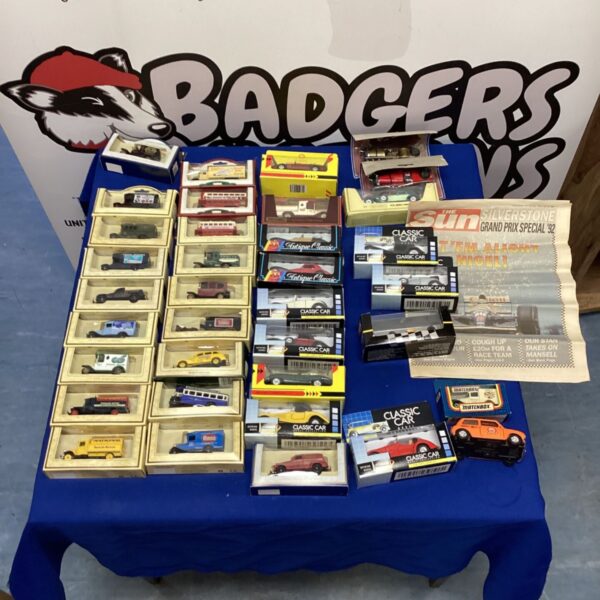 Mixed lot of diecast cars and vintage newspaper from Silverstone Grand Prix.
