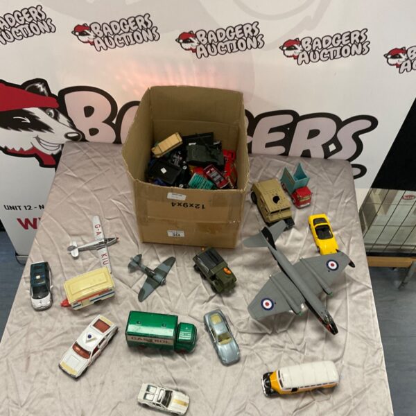 Mixed lot of diecast model vehicles and planes for collectors.