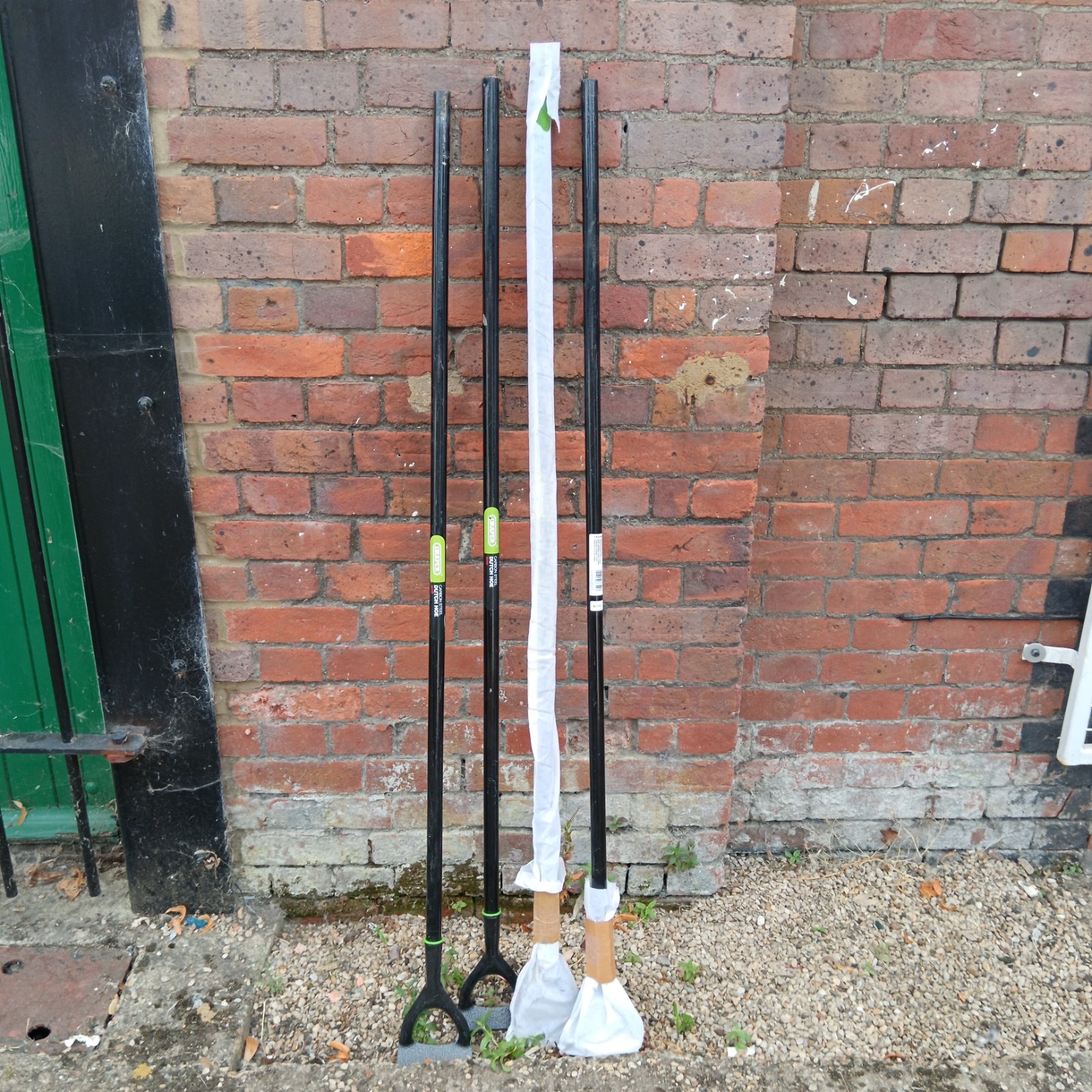 Lot of four Draper Dutch hoes for garden weeding.