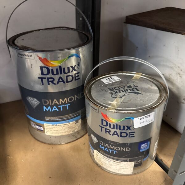 Two full tins of Dulux Trade Diamond Matt paint for interior decorating.
