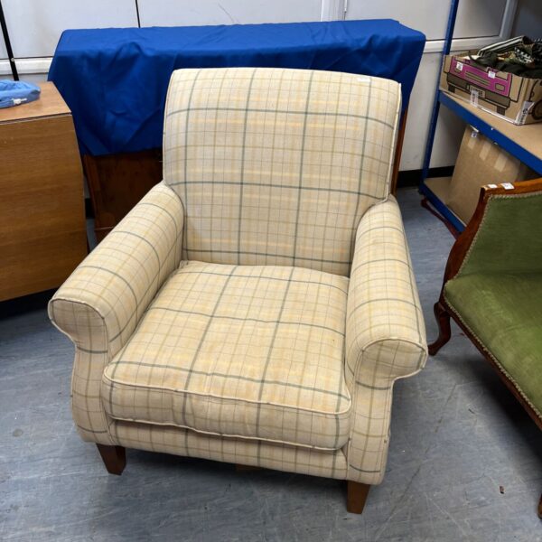 Cream checked Dunelm Orkney armchair with wooden feet.