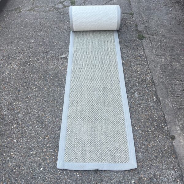 Natural sisal rug, approximately 60x800cm, ideal hallway runner.