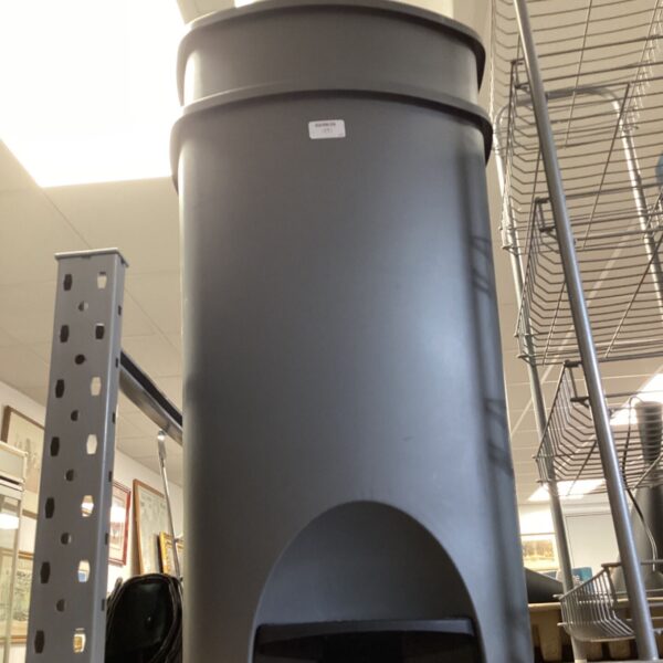 Stack of three weathered galvanized steel dust bins.