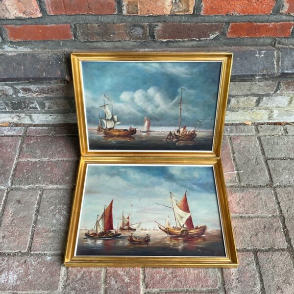 Pair of vintage Dutch maritime oil paintings of sailing ships.