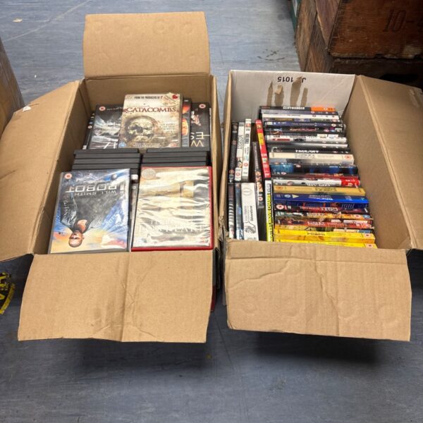Two boxes filled with a mixed lot of DVDs for home entertainment.
