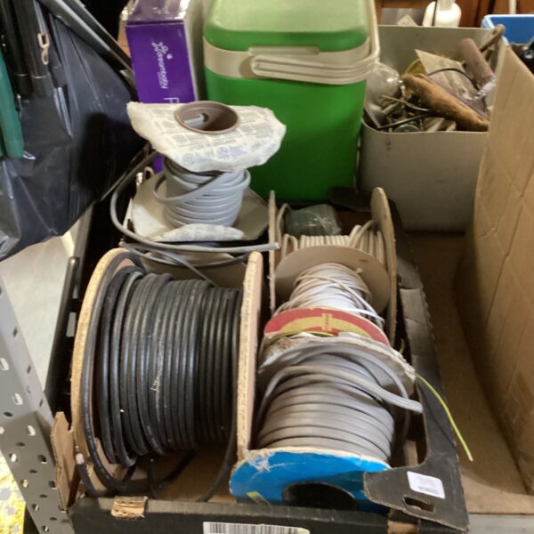 Job lot of green electric cable reels for wiring projects.