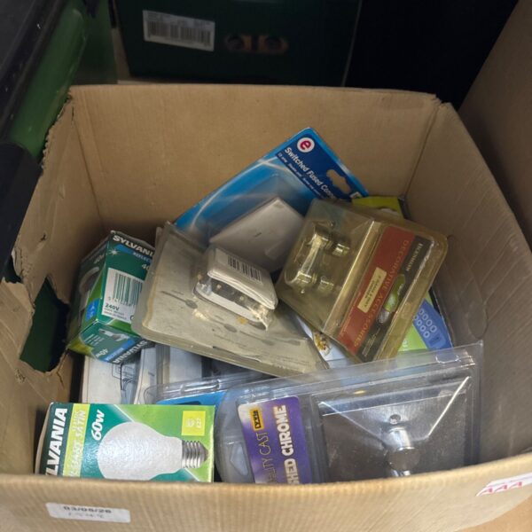 Assorted new electrical switches and fittings in original packaging.