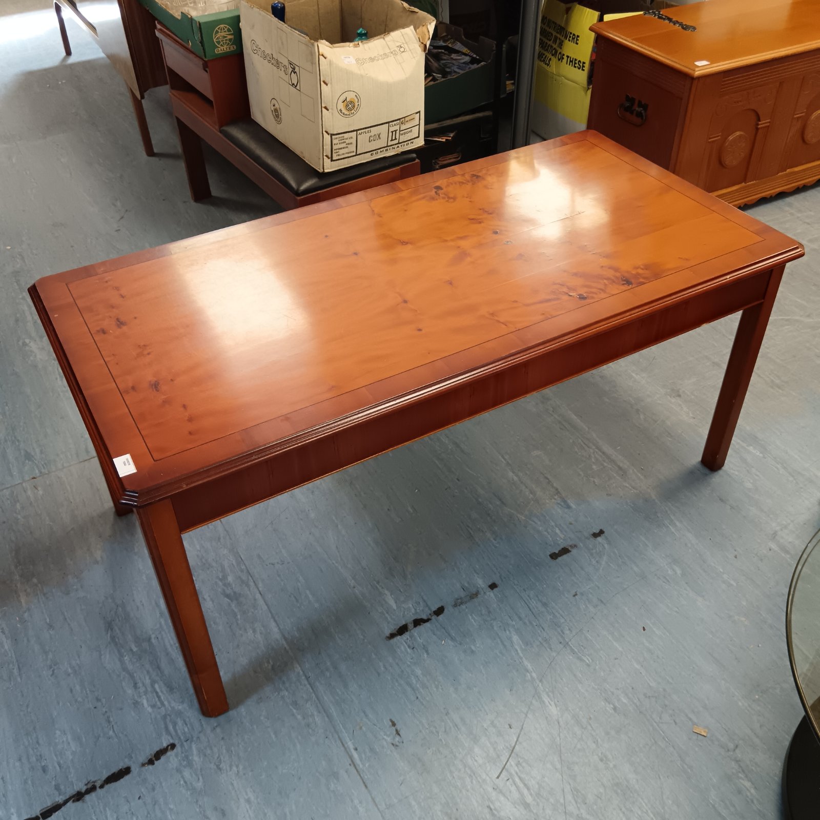 Vintage elm coffee table with a warm wood grain.
