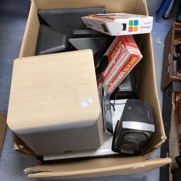 Eltax sound system and LG DVD player in a cardboard box.
