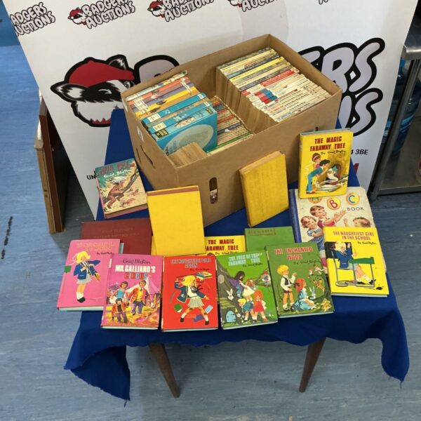 Box of vintage Enid Blyton books for collectors.