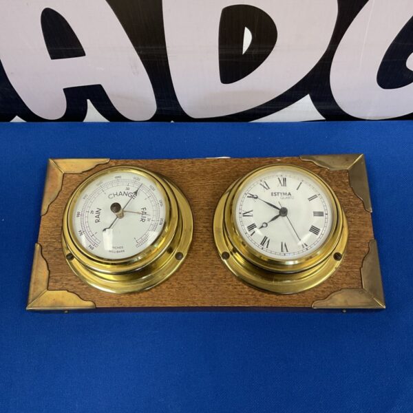 Vintage Estyma quartz ship's clock and barometer set.
