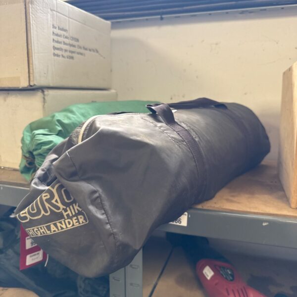 Used Eurohike Highlander small tent in a storage setting.