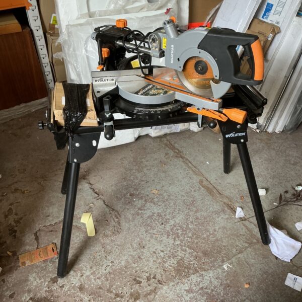 Evolution R255SMS+ mitre saw on stand, ideal for woodworking projects.