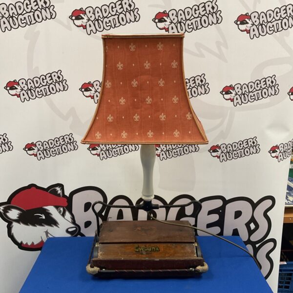 Vintage Ewbank carpet cleaner lamp with beer pump handle shaft.