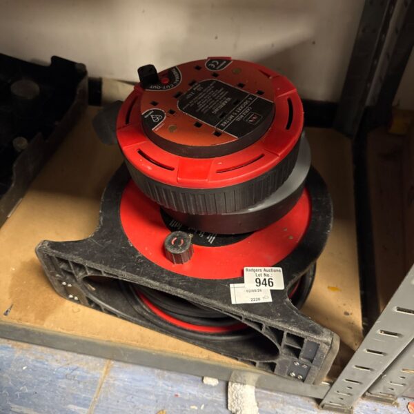 Red 30m extension reel for garden and outdoor use.