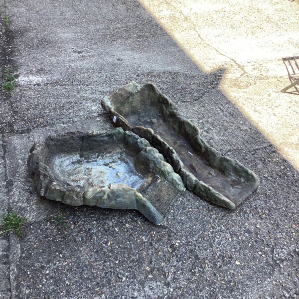 Weathered fibreglass water feature for garden or patio use.