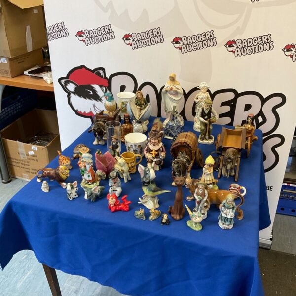 Large collection of vintage figurines including Wade animals.