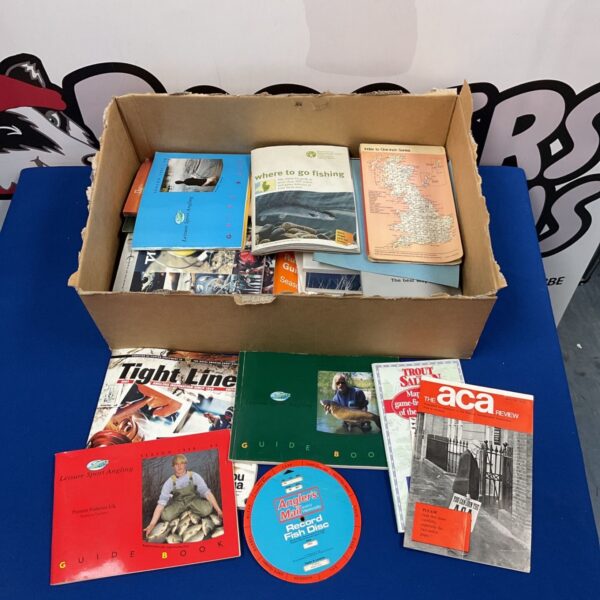 Vintage fishing guides and ephemera collection for angling enthusiasts.