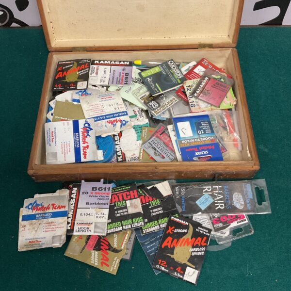Vintage Kamasan fishing hooks and floats lot in a wooden box.