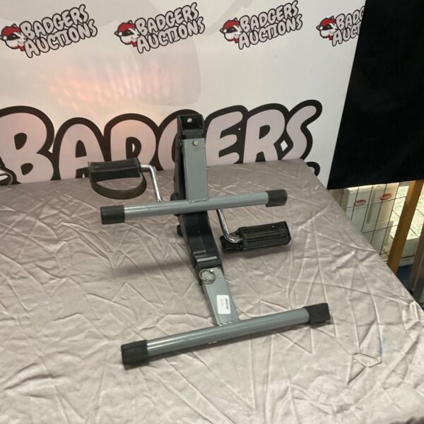 Silver fitness peddler for home cardio and exercise.