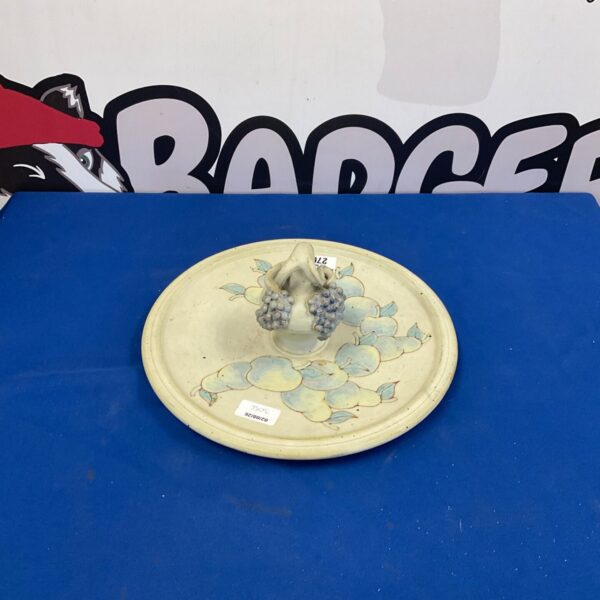 Vintage floral earthenware serving plate for display.