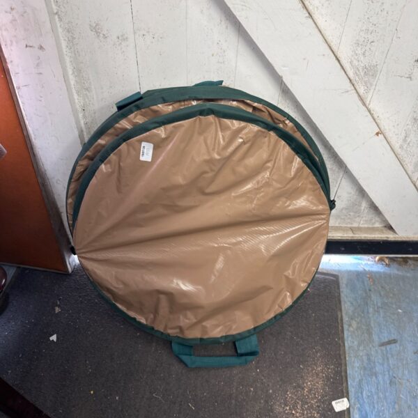 Collapsed folding garden waste bin for easy garden tidy.