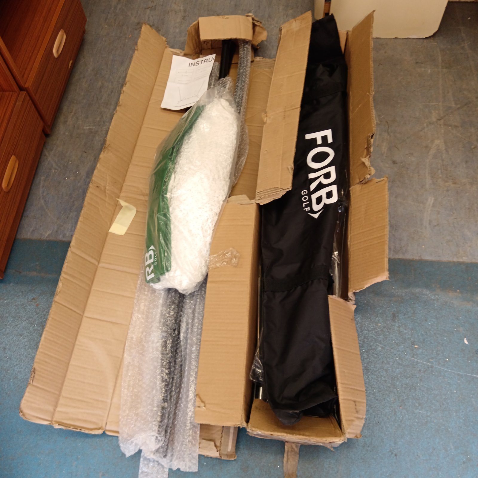 Forb golf practice net kit in original packaging.