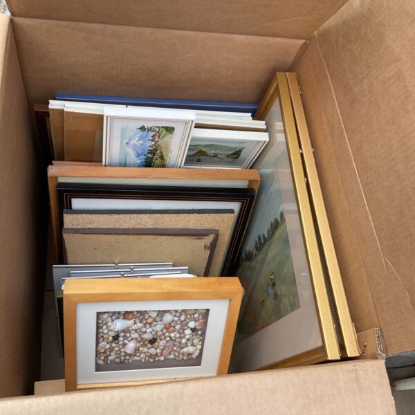 Mixed lot of framed artwork with varied styles and frames.