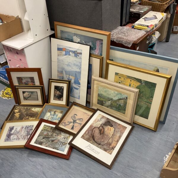 Large lot of framed prints including a Picasso attributed piece for wall decor.