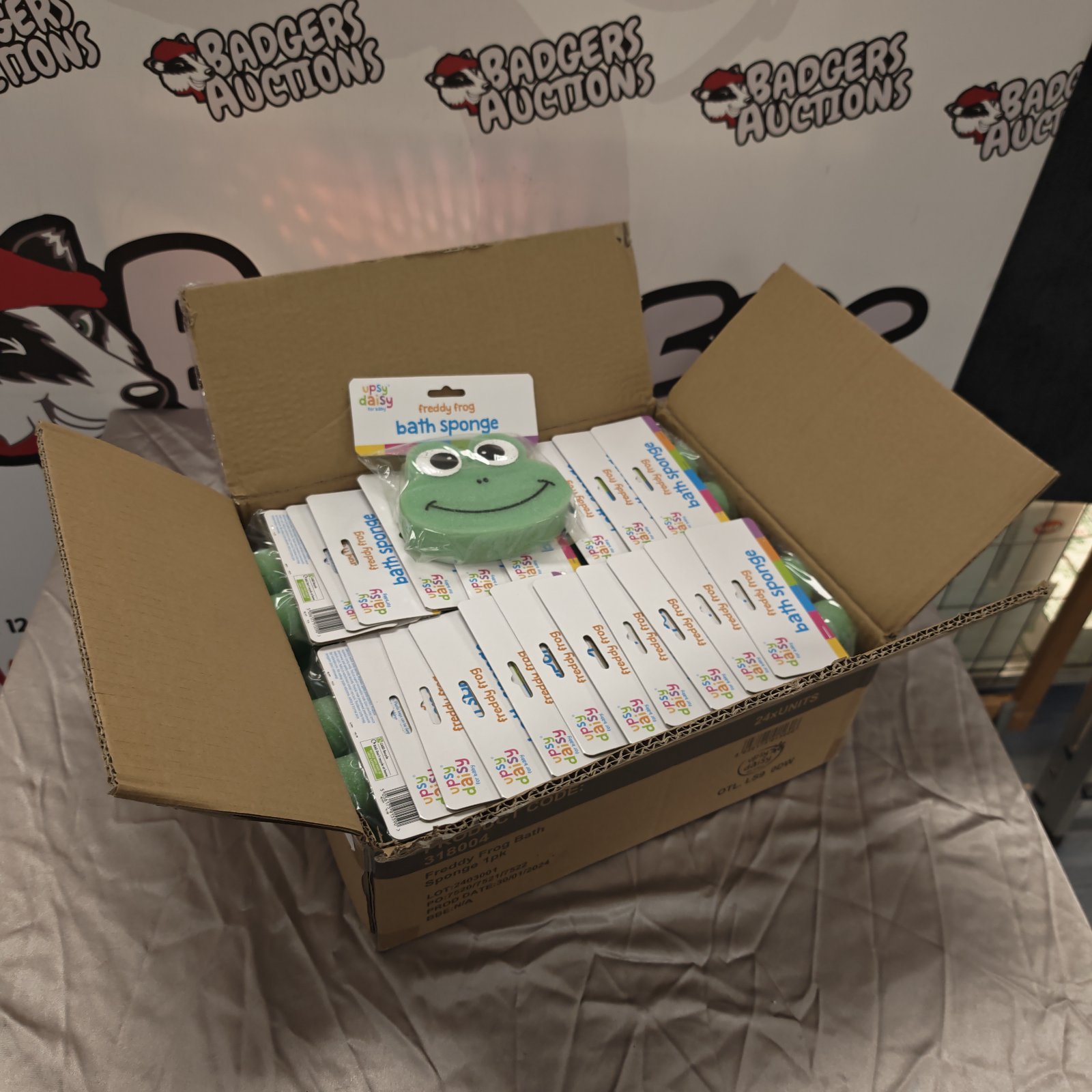 Box of unused Freddy Frog bath sponges for children's bath time.