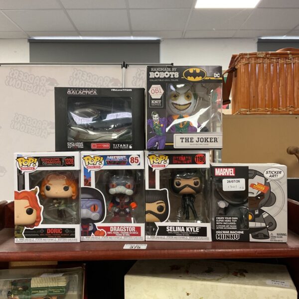 Funko Pop and Titan figure collection with handmade robots.
