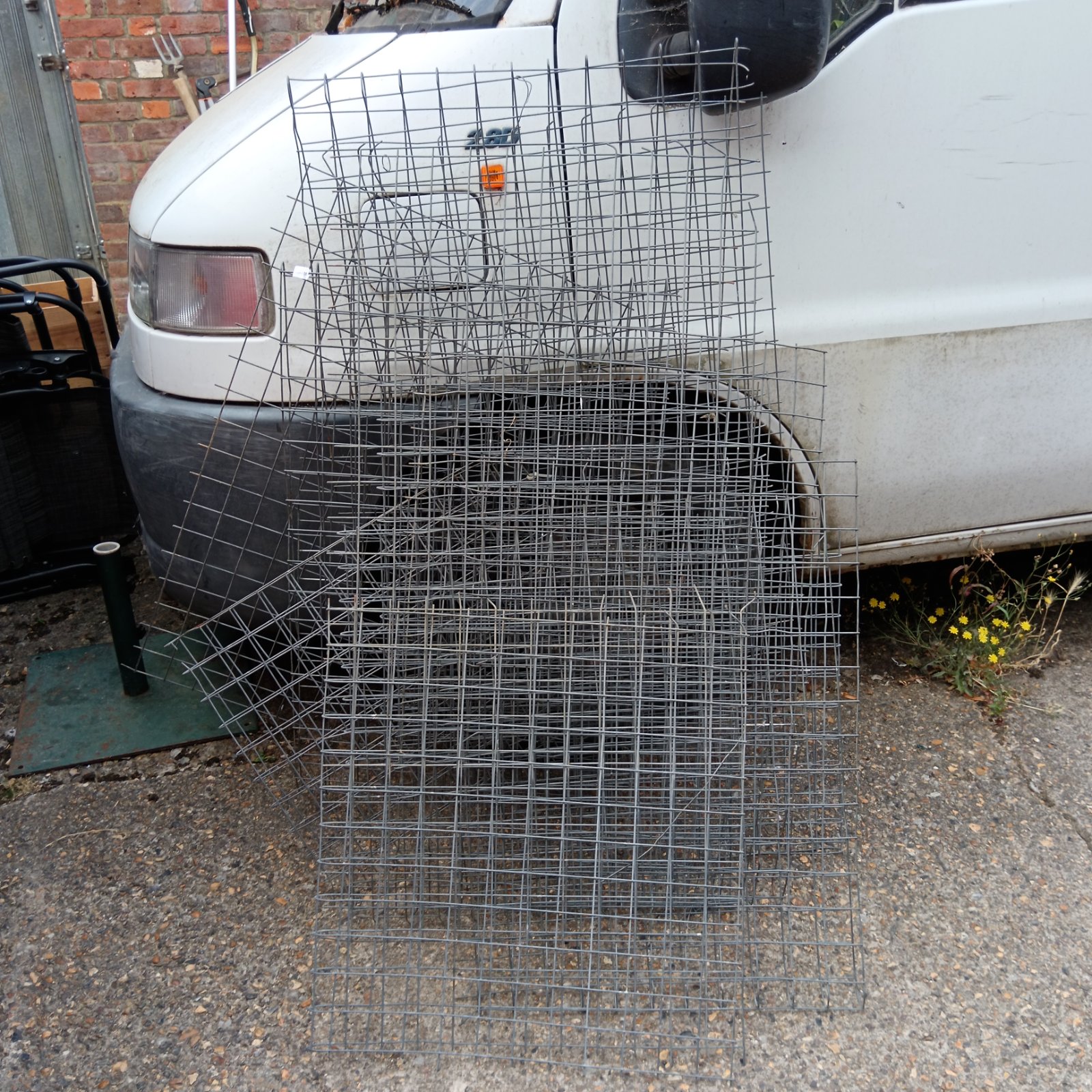 Lot of galvanized wire fencing for garden or agricultural use.