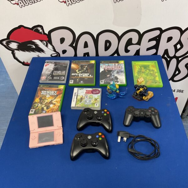 Gaming console bundle featuring Nintendo DS, Xbox 360 and Playstation 3 controllers.