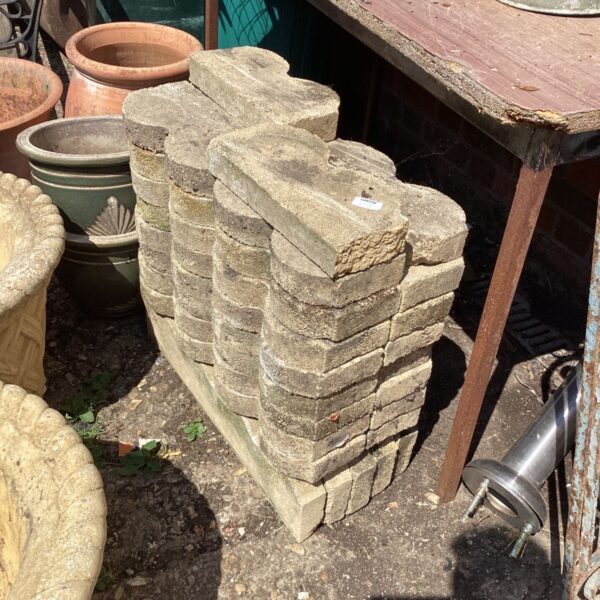 Quantity of weathered garden edging stones for garden borders.