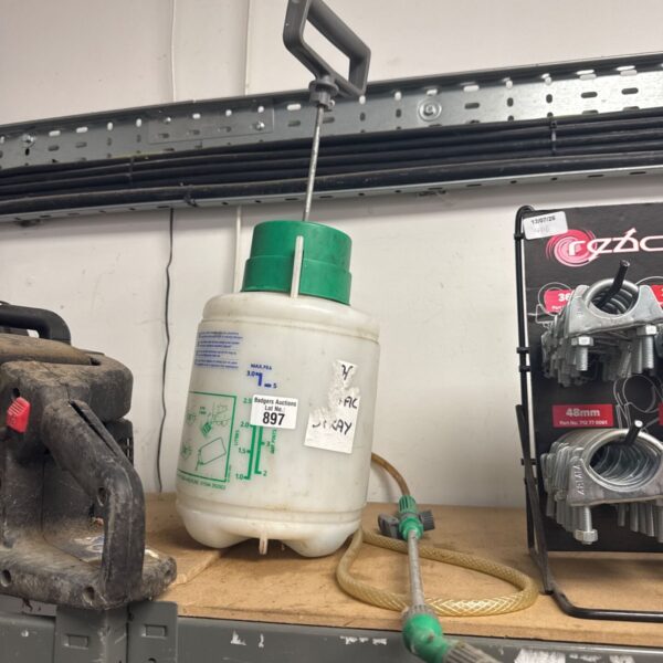 Green 5L garden pressure sprayer with a pump handle.