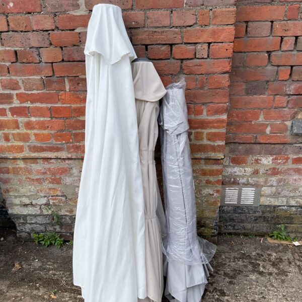 Job lot of used garden umbrellas from B&Q returns.