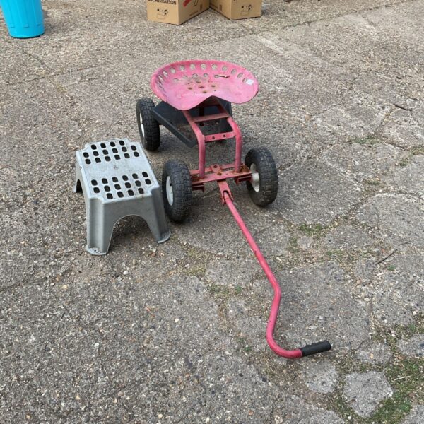 Used garden weeding trolley with seat and wheels.