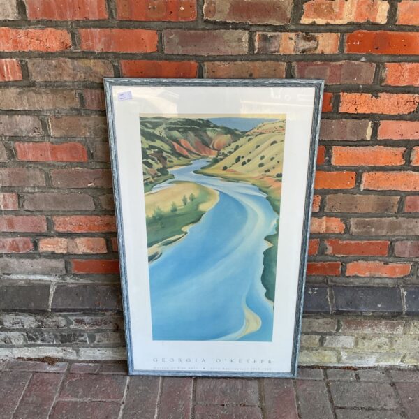 Large Georgia O'Keeffe museum print of a landscape with rolling hills.